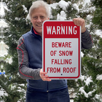 Beware of snow falling from roof sign