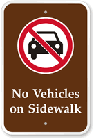 No Vehicles On Sidewalk with Graphic Sign