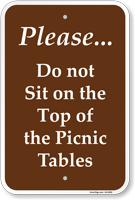 Please Do Not Sit On The Top Of Picnic Tables Sign
