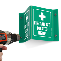 Sign indicating location of first aid kit