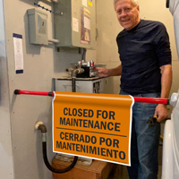 Closed for maintenance door barricade sign