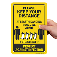 Keep your distance: At least four penguins apart sign