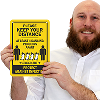 Safety sign Maintain distance illustrated with penguins